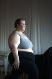 Carol Squires warming up before a rehearsal  session of the Phat Fly Girls, a hip hop performing ensemble featuring fat dancers.  The  Phat Fly Girls shows are produced by Big Moves, the only service organization in the world dedicated to promoting size diversity in dance.   The pro-fat acceptance movement promotes body-acceptance and fitness at any size. It fights to eliminate discrimination based on body size and provide fat people with the tools for self-empowerment