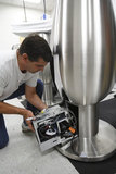Provina's engineer Fred Hekking assembling a WinePod unit at the company's headquarters in San Jose, CA, on September 5, 2008. The WinePod is the world's first personal winemaking system that allows anyone to make wine at home with no experience required.   The WinePod is made and distributed by Provina, inc.