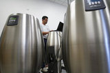 Provina's engineer Fred Hekking testing of the WinePod units during the  assembly process at the company's headquarters in San Jose, CA, on September 5, 2008. The WinePod is the world's first personal winemaking system that allows anyone to make wine at home with no experience required.   The WinePod is made and distributed by Provina, inc.